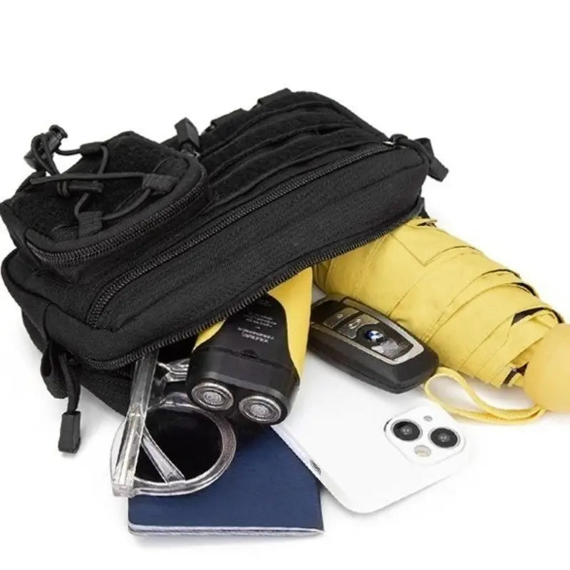 MOLLE admin pouch packed with a phone, torch, notebook and small tools
