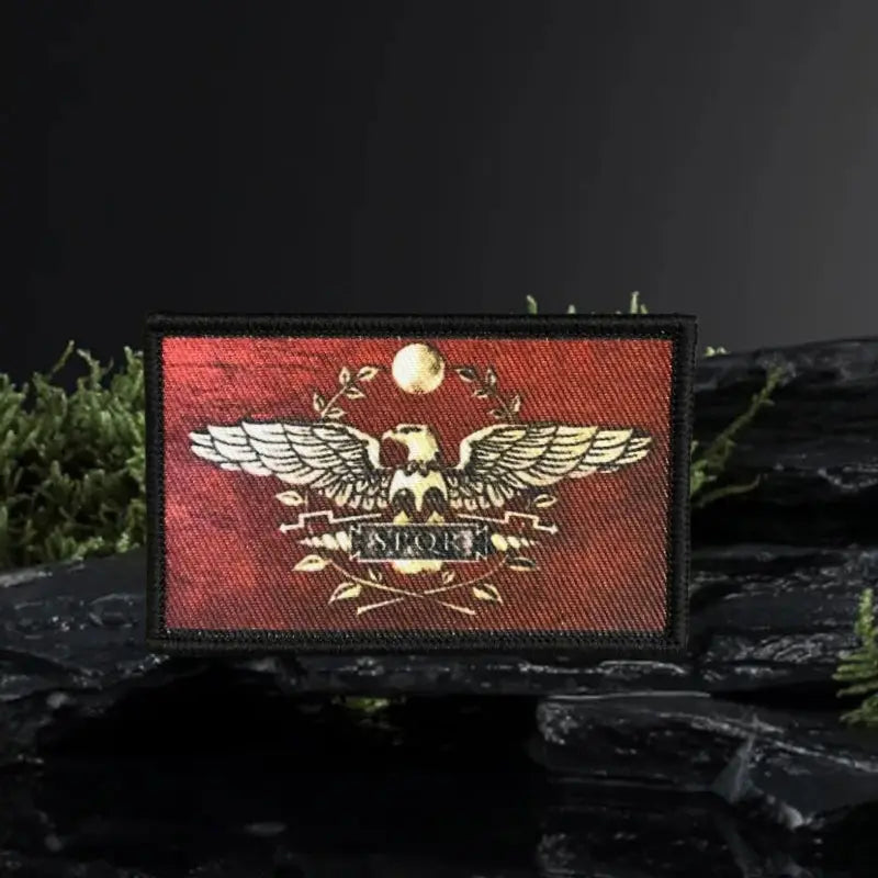 SPQR Roman eagle patch on rock