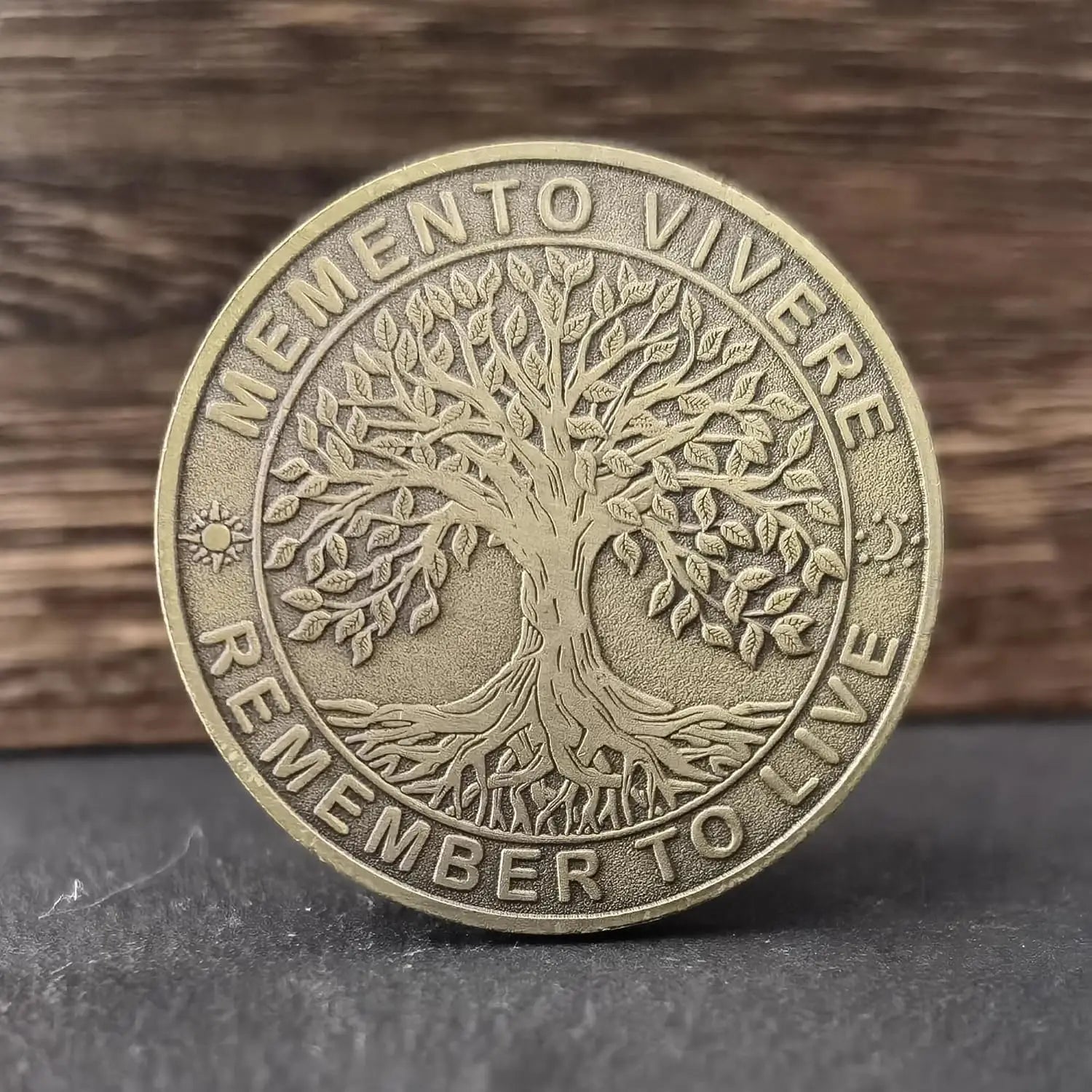 Memento Mori coin held in hand