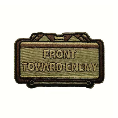 Front Toward Enemy Claymore morale patch, tan PVC, hook-backed