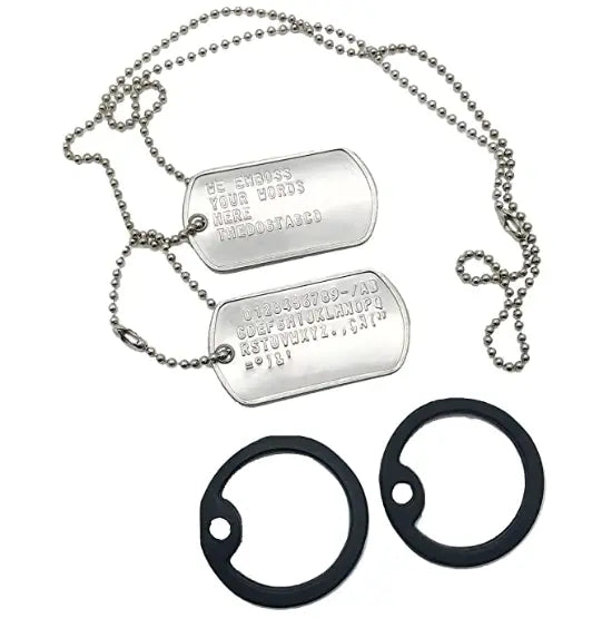 Outline view of two dog tags with rubber silencer edging