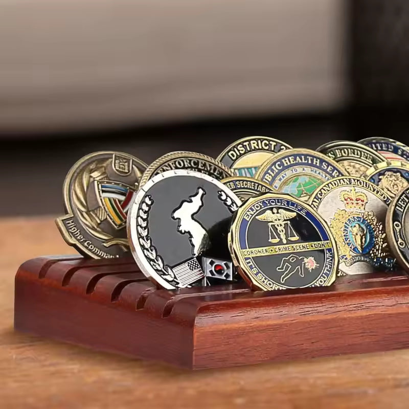 Wooden challenge coin display rack on tabletop